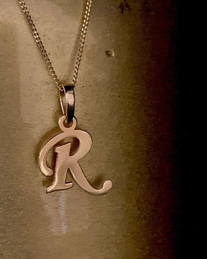 Inicial de Oro