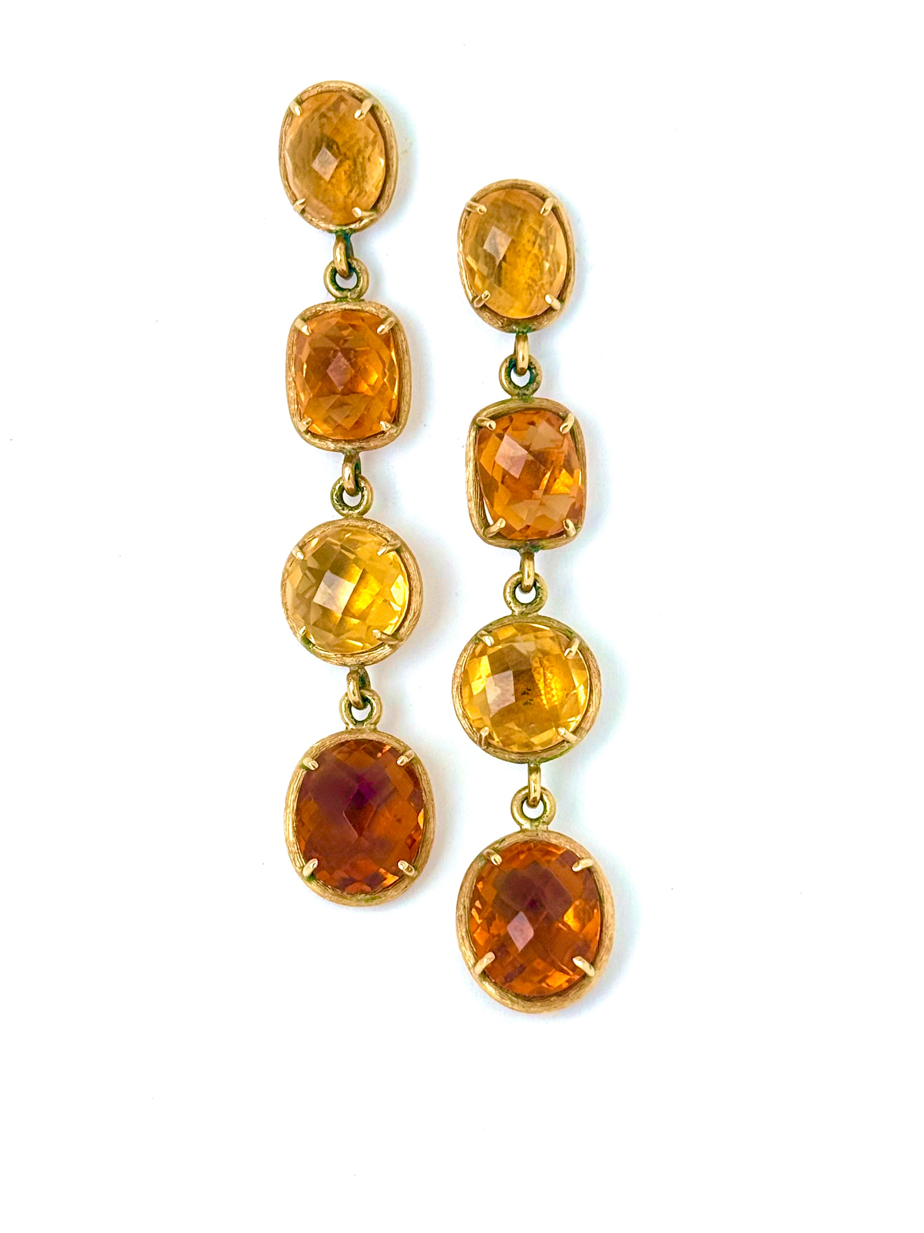 Aretes largos de cítrinos en oro de 18k