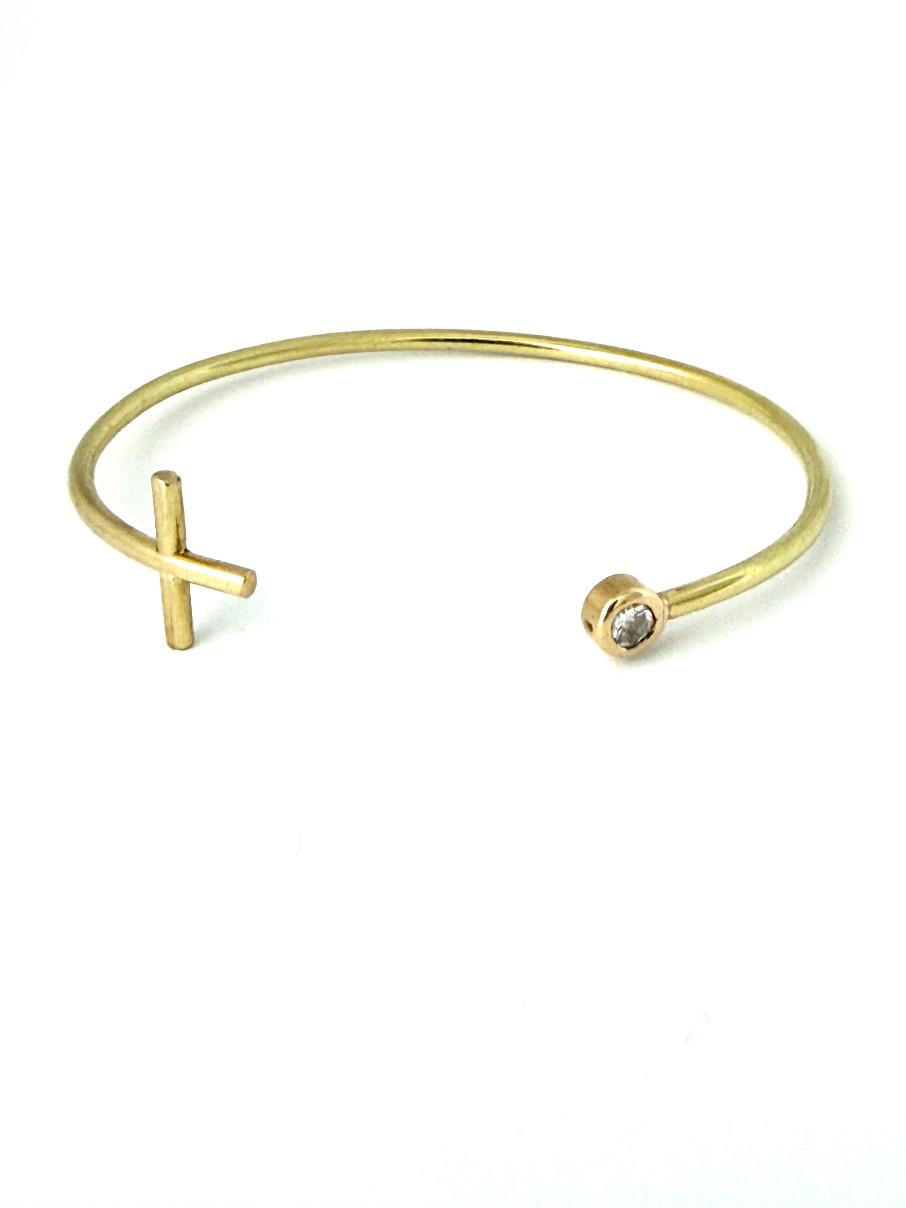 Pulsera cruz - diamante (.25ct, calidad VS1, color G), en oro amarillo de 18k, tamaño 14.5 cm