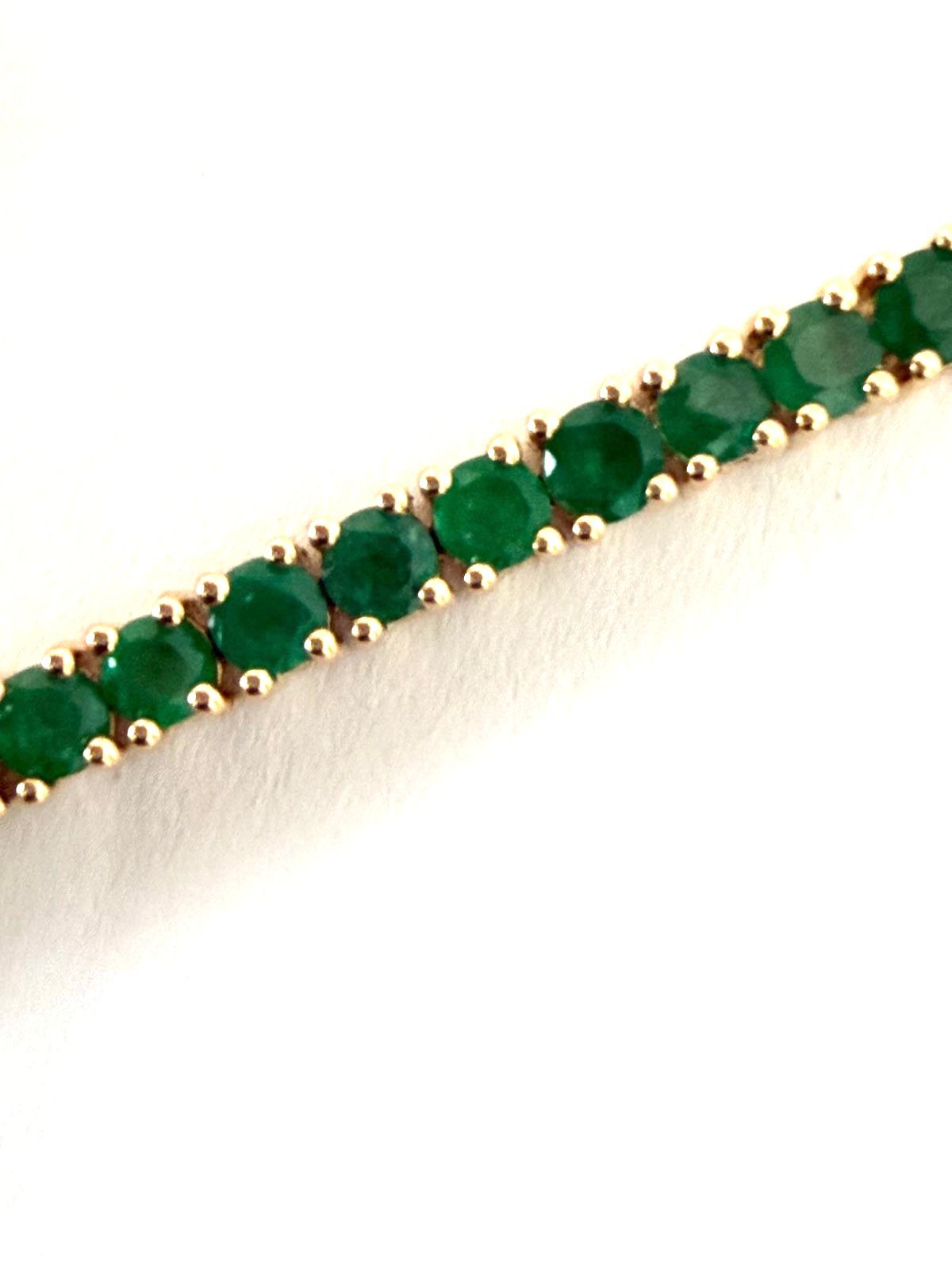 Pulsera, tenis en oro de 14 K con esmeraldas 