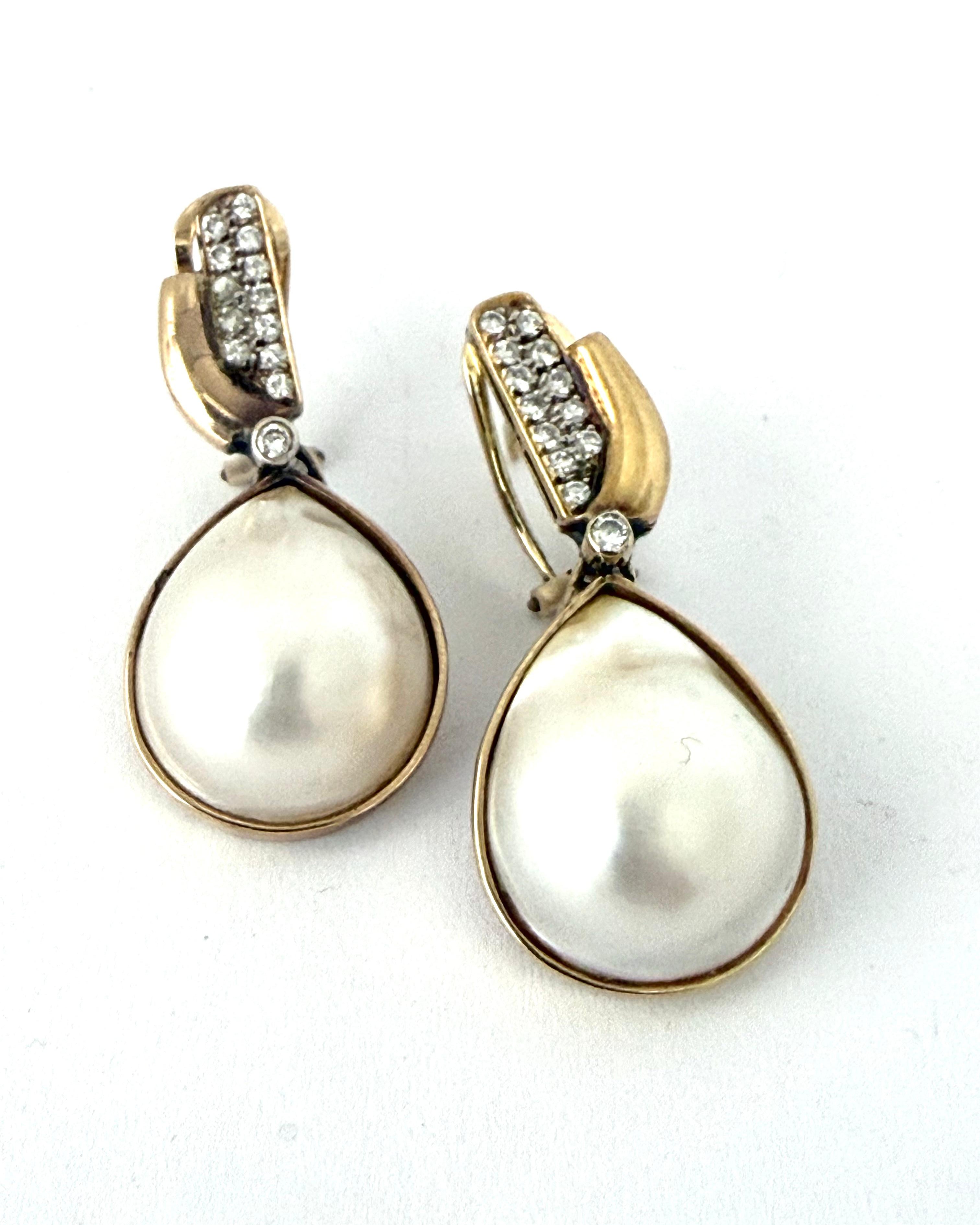 Aretes Medias Perlas