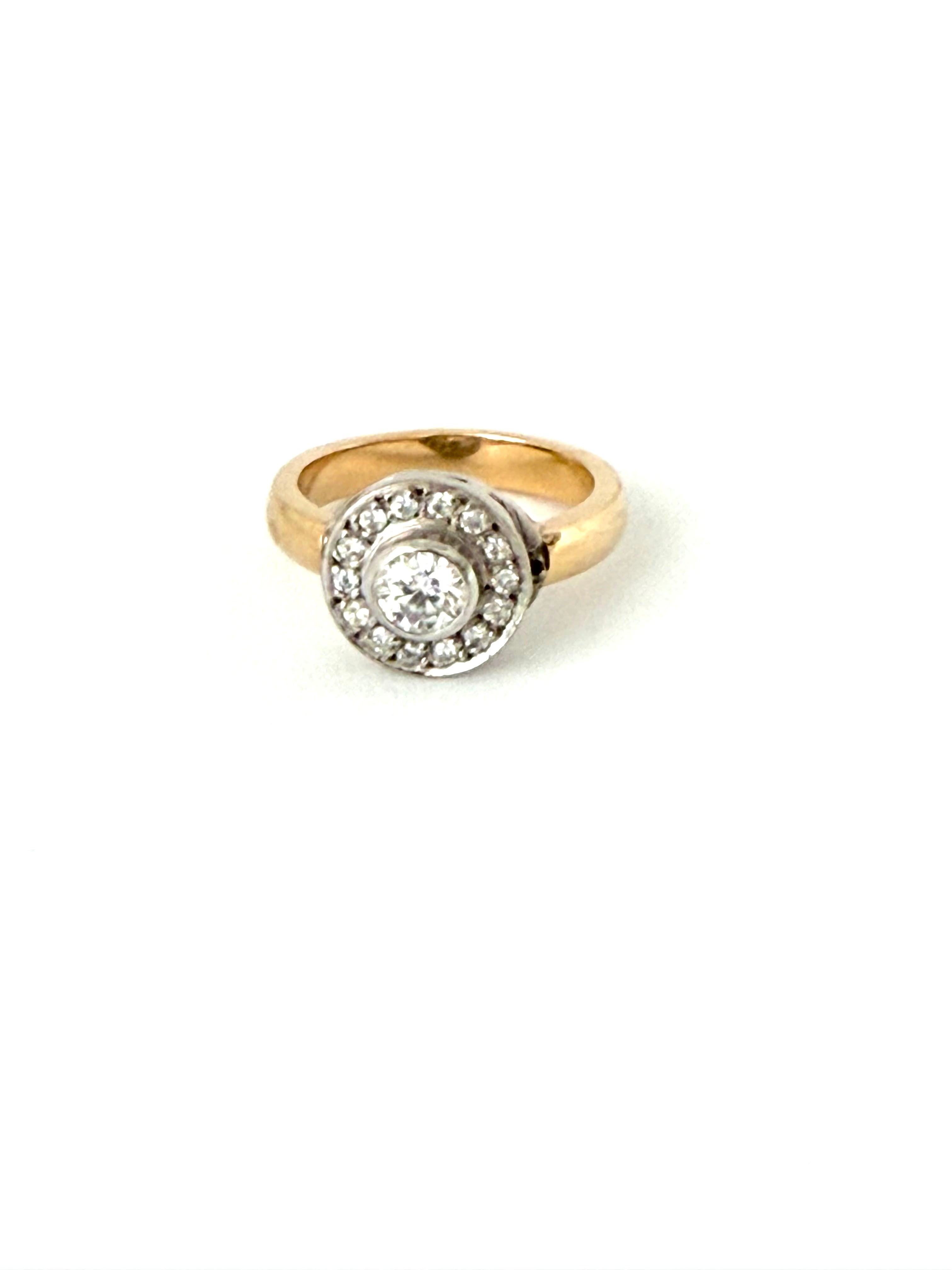 Anillo de diamante en oro amarillo y blanco de 18k, diamante central .25 ct